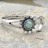 Anillo vintage con sol y luna en ópalo