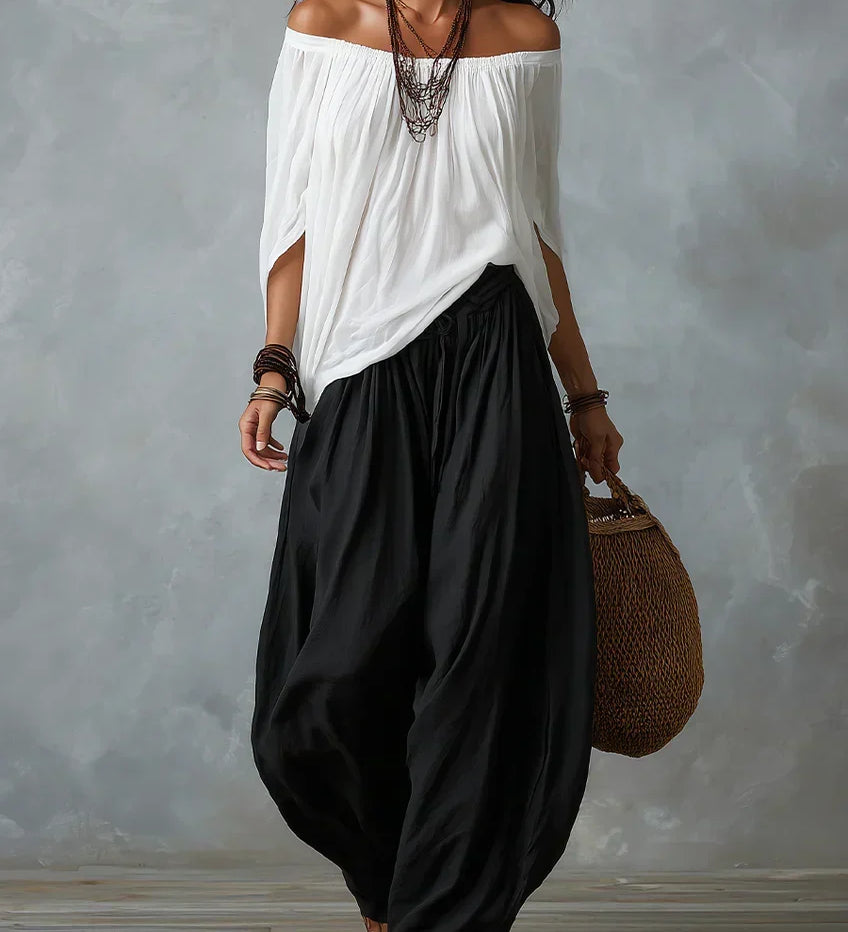 Top con hombros al descubierto y pantalones de farol