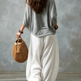 Top con hombros al descubierto y pantalones de farol