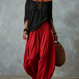 Top con hombros al descubierto y pantalones de farol
