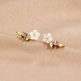 Pendientes de flor blancos cristalinos