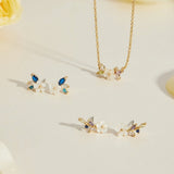 Pendientes de flor blancos cristalinos