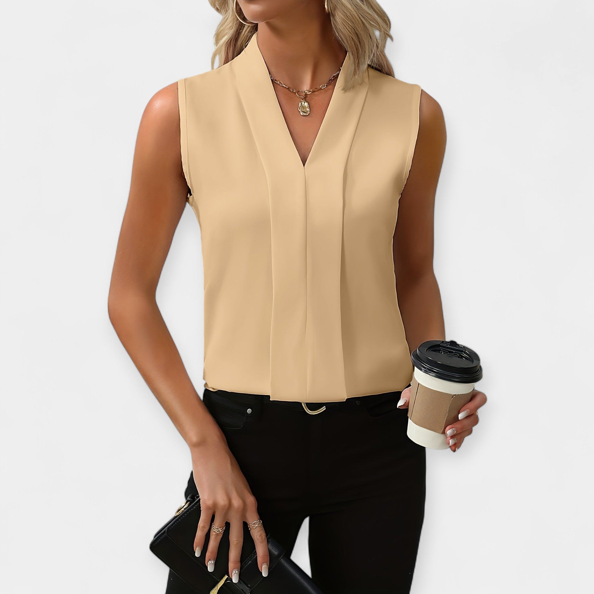 Marta – Blusa sin mangas de estilo clásico