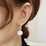 Pendientes elegantes con perlas