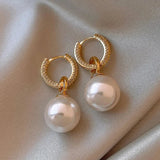 Pendientes elegantes con perlas