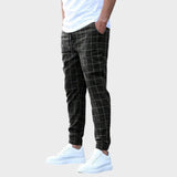 Mikkel - Pantalones deportivos a rayas estilizados